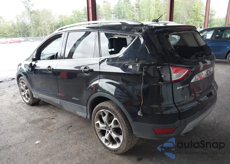 2016 Ford Escape Titanium z USA, uszkodzony, nr VIN 1FMCU9J99GUB10501